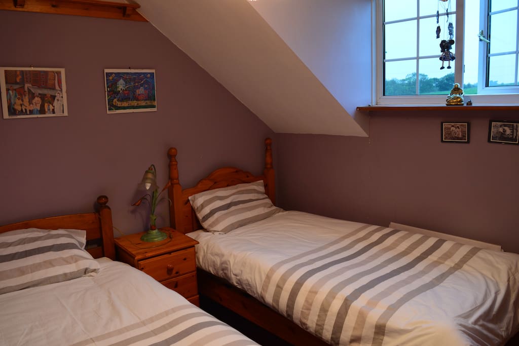 Bedroom 1 with two single beds
