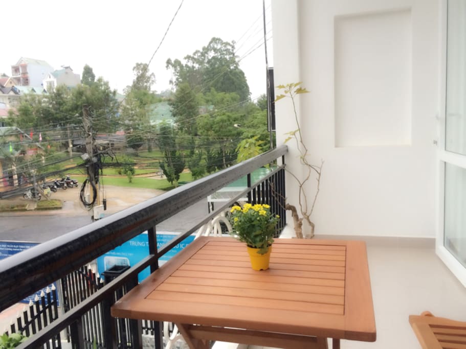 Enjoy the view of the park with a cup of coffee from our balcony