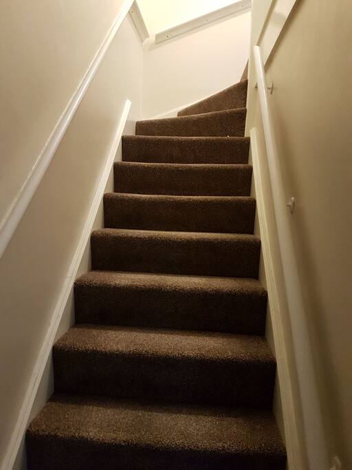 Staircase leading to upstairs rooms