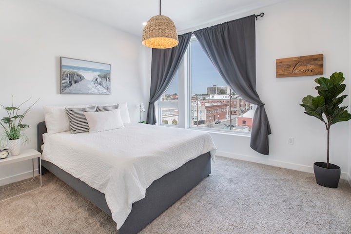 Spacious master bedroom with amazing city, and bridge view.  You can see the city light and iconic Vincent Thomas Bridge out of its windows.  It comes with a walk-in closet.