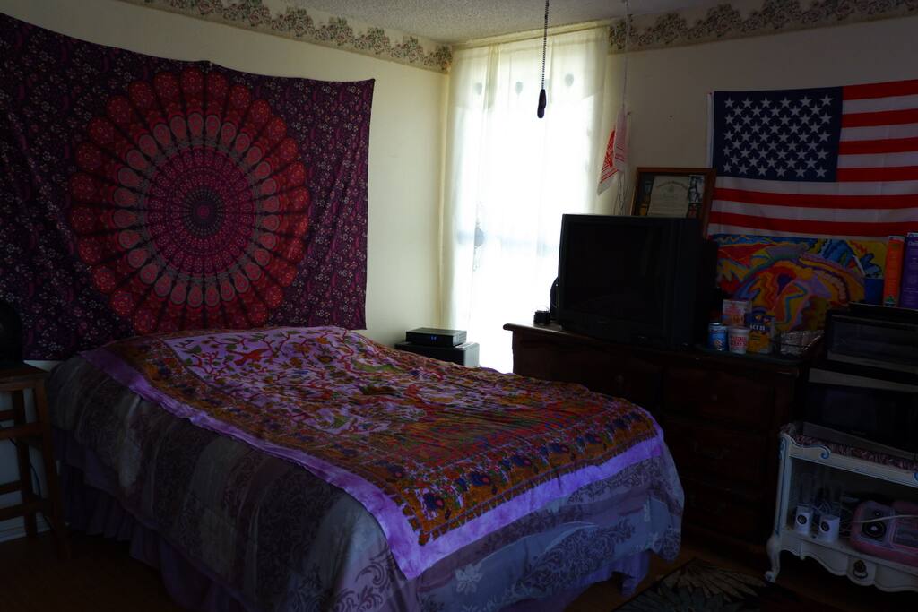 Queen size bed with night stand and copy machine