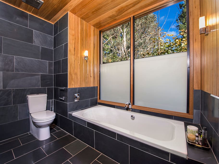 Bathroom with separate walk in shower