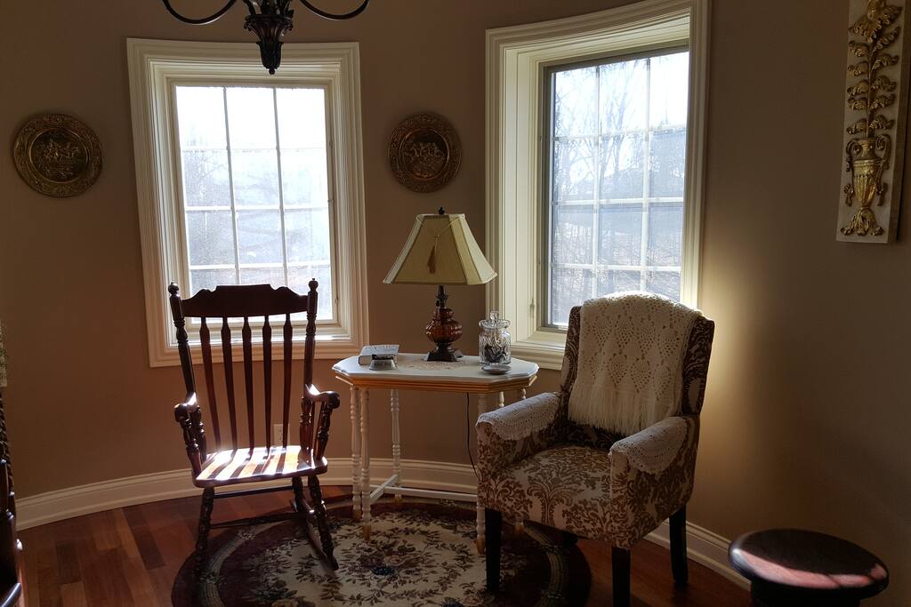 A comfortable seating area below the room.