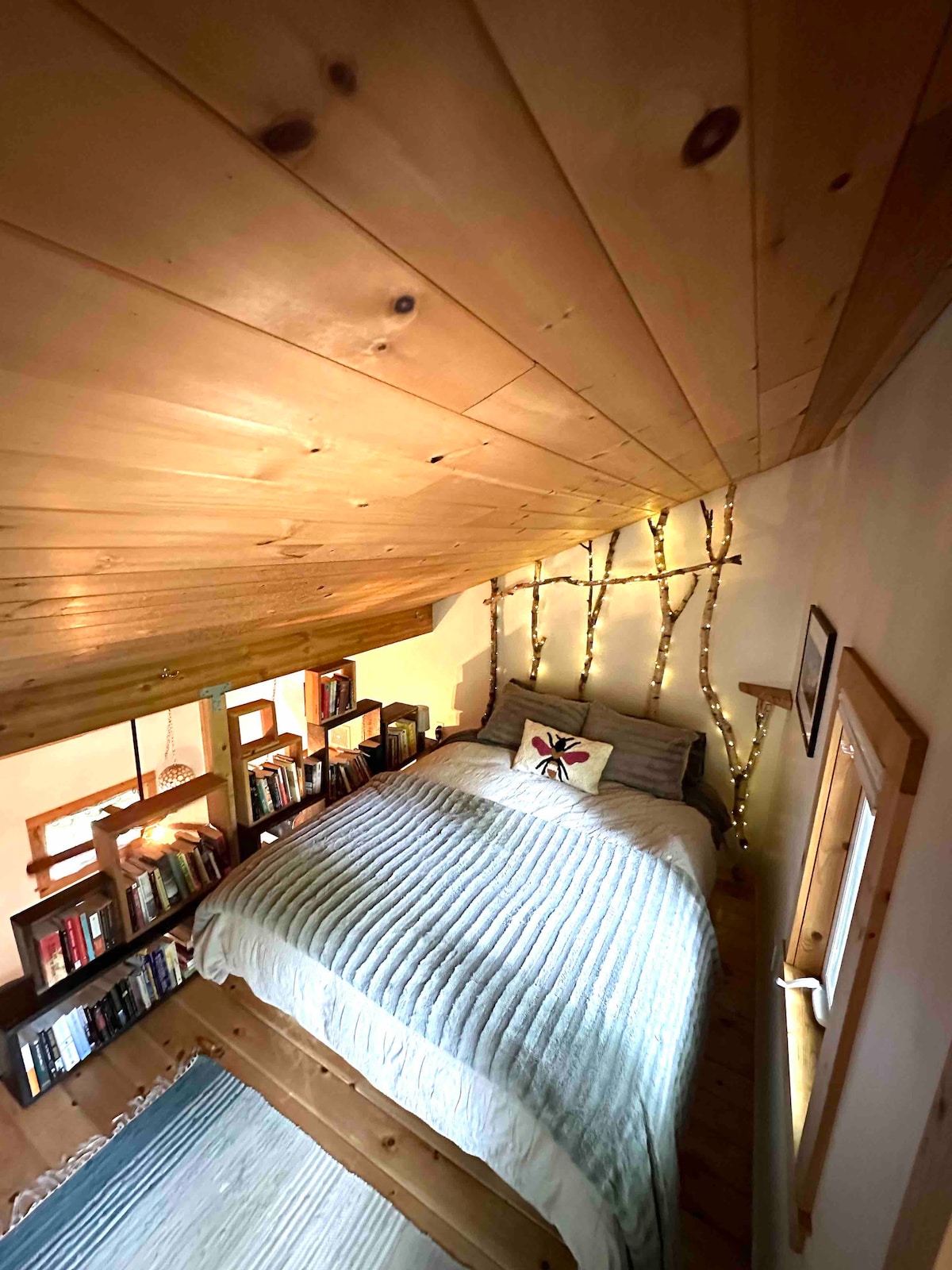 Queen size bed in the loft bedroom