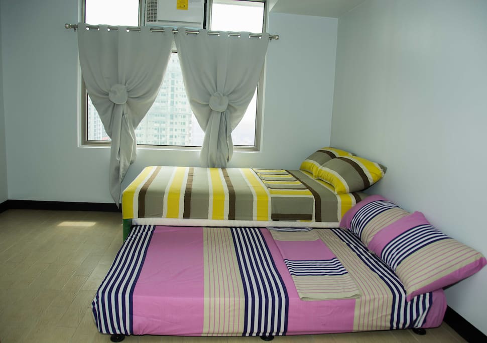 First Room: Two Double Beds, good for four people