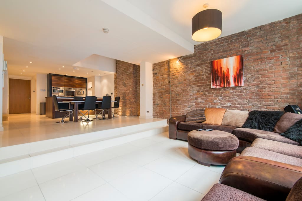 Large open plan lounge, kitchen-diner with comfy sofas