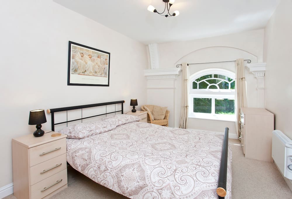 Bedroom with feature window