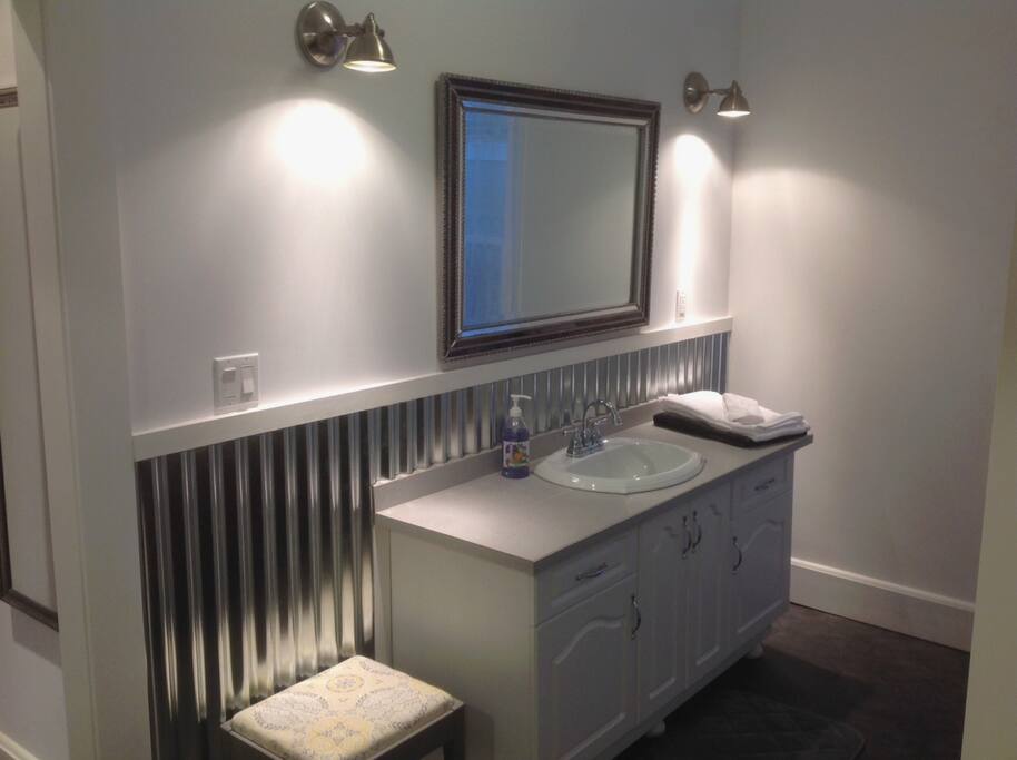 This luxurious, very spacious bathroom is mere steps to the master bedroom.