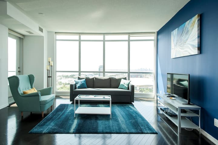 Private Luxury Downtown Toronto 2 Bedroom, 2 Washroom Condo suite with Stunning Waterfront views, Oak hardwood flooring, Granite kitchen counters, and Marble washrooms!  A private parking spot in the building is complimentary with your stay!