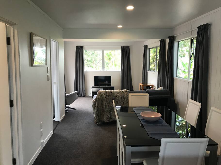 Main lounge dining area with table and seating for six