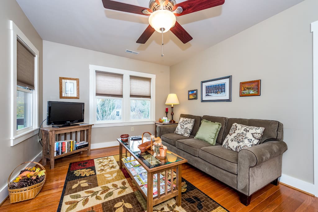Recently remodeled living room offers a cozy setting for gatherings.