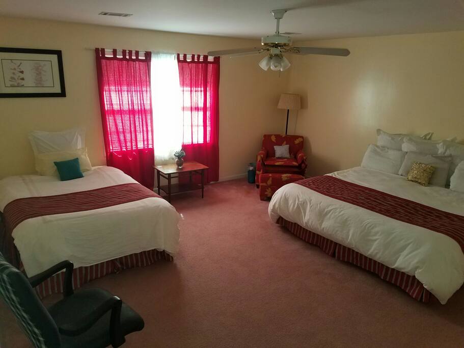 Huge Master bedroom receives great morning light.
It features both a King and Queen bedding and an aditional full size pillow top mattress occupies the spacious walk in closet.
Ceiling fan is available (in addition to central air throughout home).