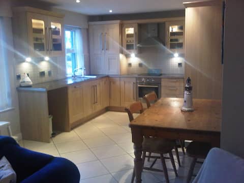 Successful Airbnb property: Spacious 3 bedroom, 3 bathroom beach apartment! in Bann