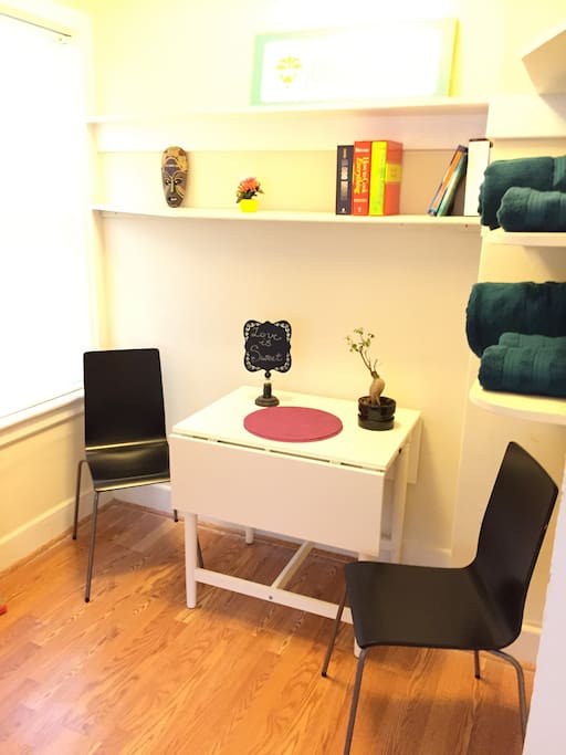 Enjoy a meal or coffee in this bright little nook.