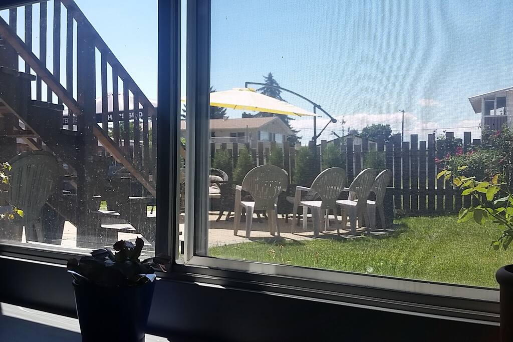 Large indoor and outdoor patio area. View from kitchen.