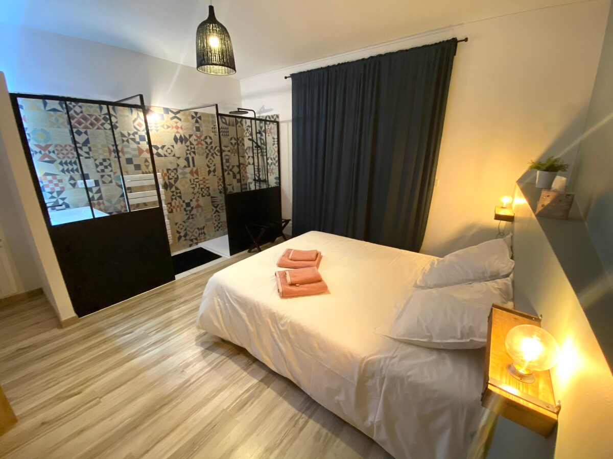 Bed 160 and bathroom in the room