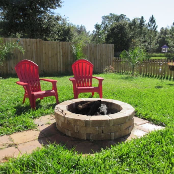 Nice shared backyard for your relaxation. Fire pit and gas grill available.