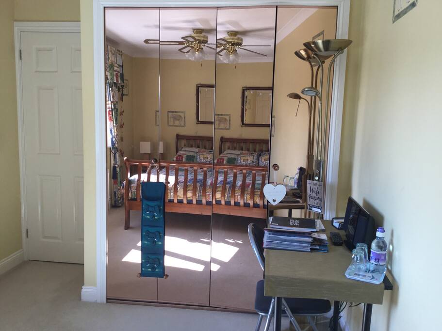Double mirrored hanging space.