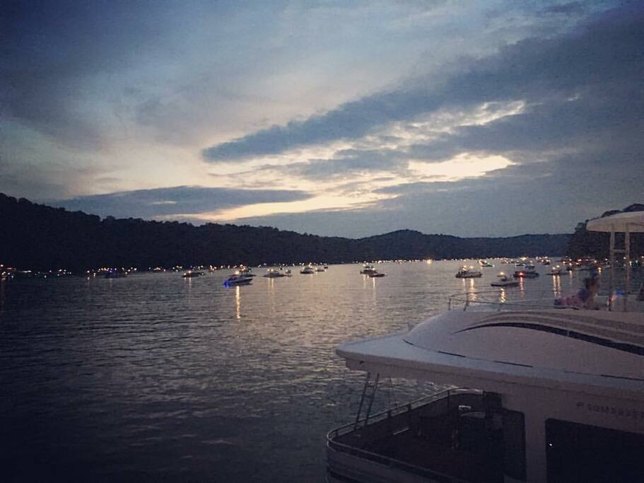 These are the boats coming in to see the fireworks, taken off the back (stern) top deck