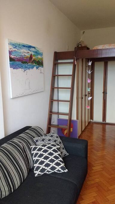1 sofa and upstairs with 2 beds