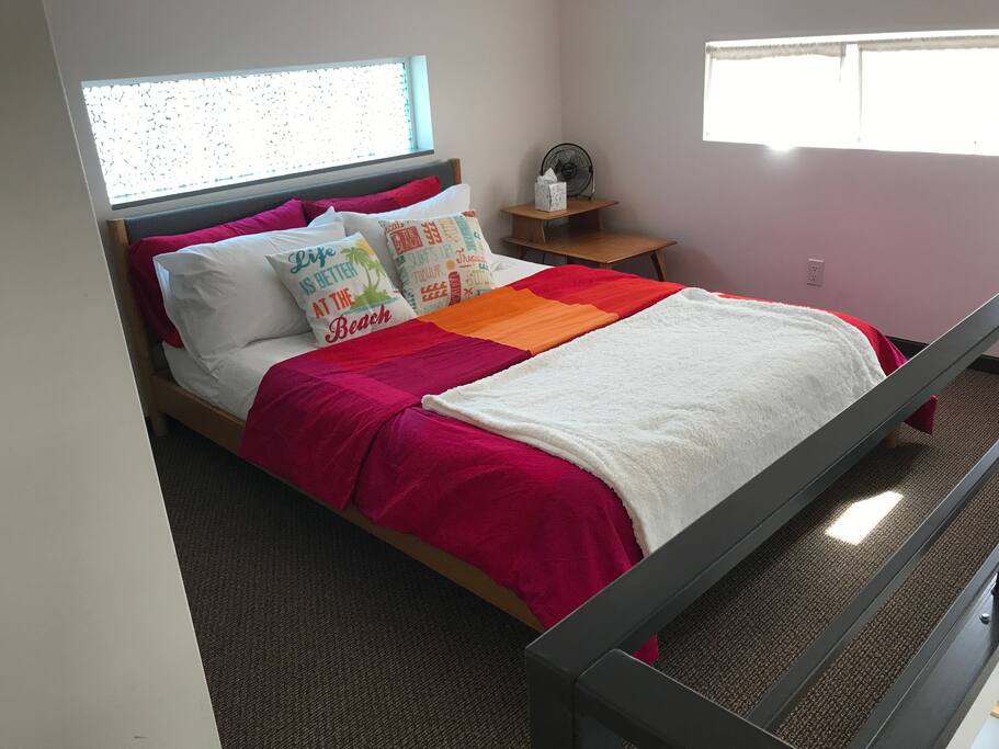 Tempur-Pedic colorful queen size bed.