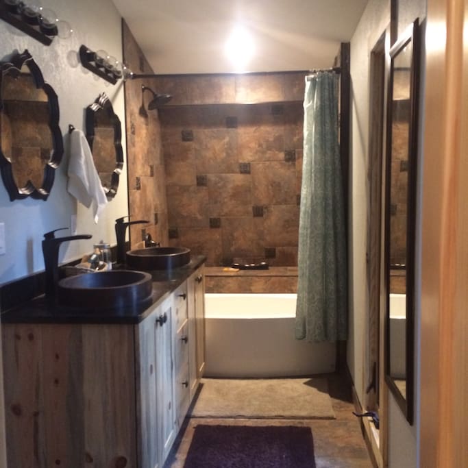 Your bathroom. It is Jack and Jill style, and is shared with one other bedroom that may or not be rented. Your room and the other bedroom are located on the top floor, along with this bathroom.
