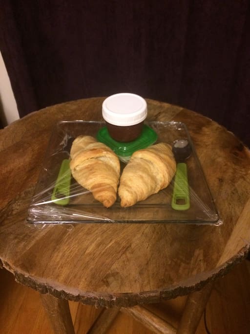 Fresh baked croissants w/ butter and jam on arrival