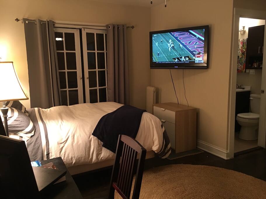 TV swivels to watch from bed or loveseat