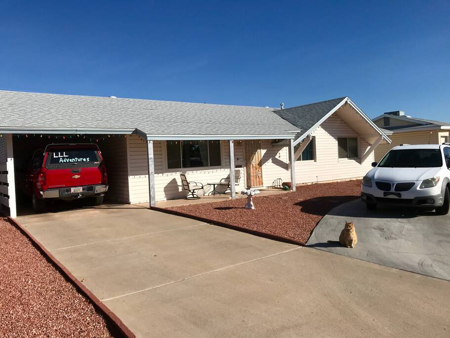 Front of home showing ample parking. (from the west)