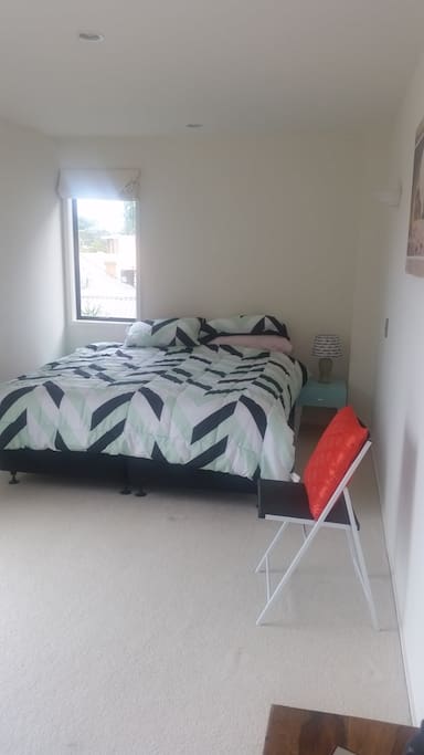 Large room with comfortable Queen size bed.