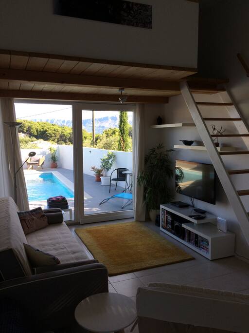downstairs lounge with view to pool