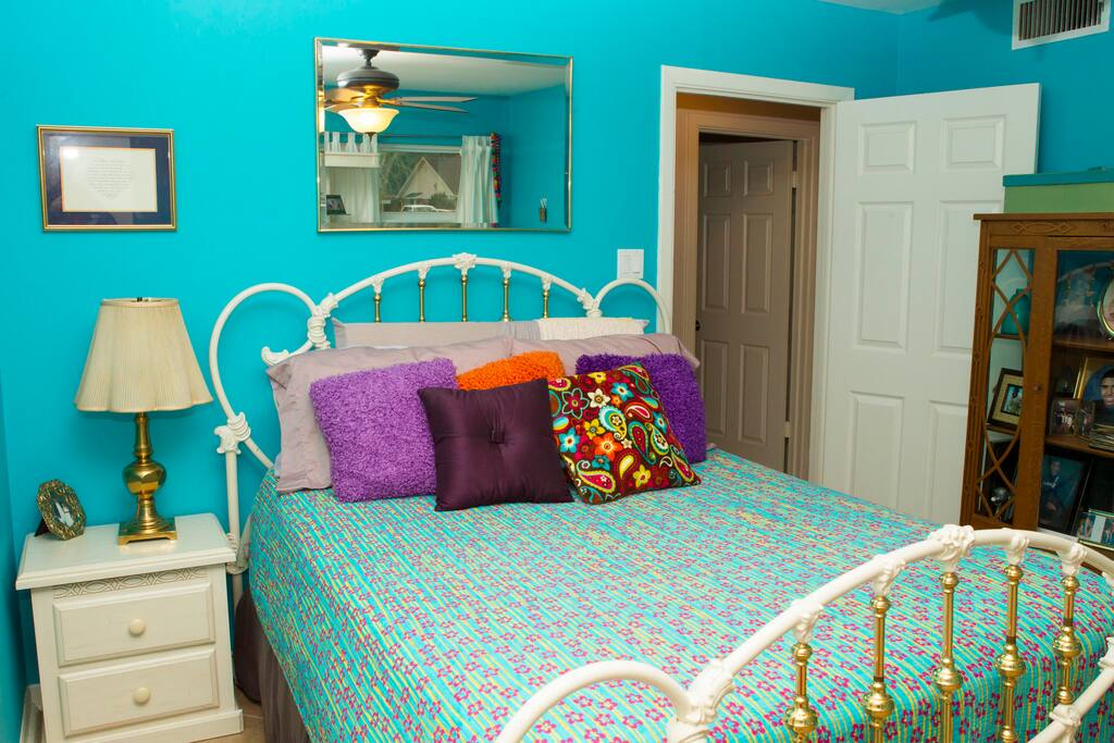 Nice queen size bed with desk area, sitting area, and ensuite