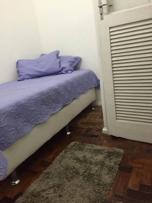Room with single bed.