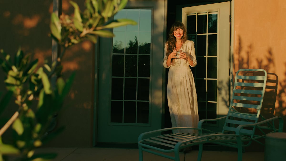 Host showing their property to guests