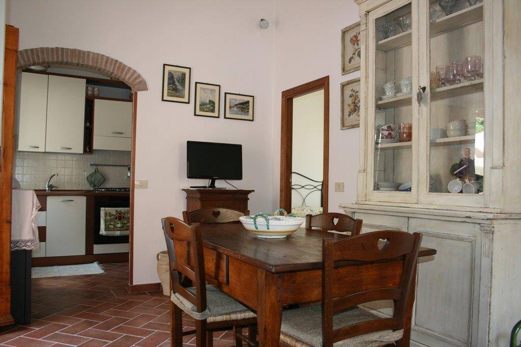 Ingresso sala pranzo con cucina