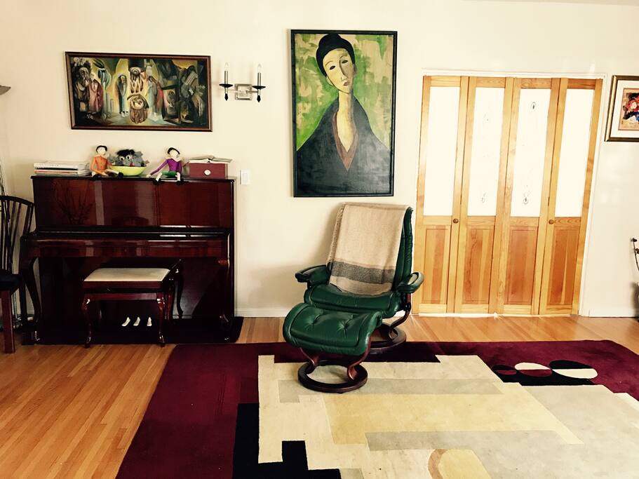 Living room from front door (tv room with sofa bed through french doors)