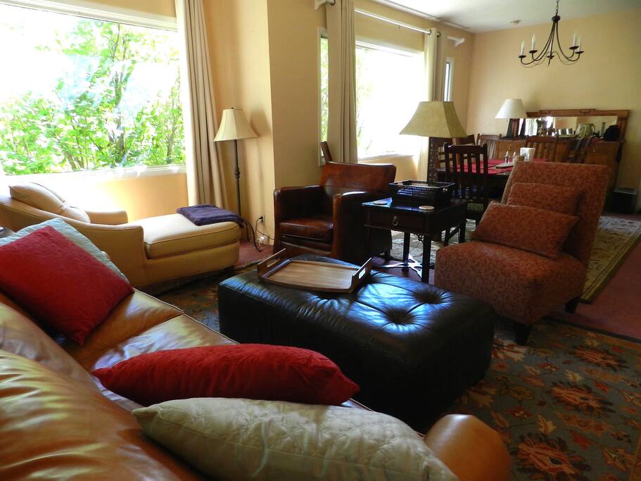 Living room with dining room in background.
