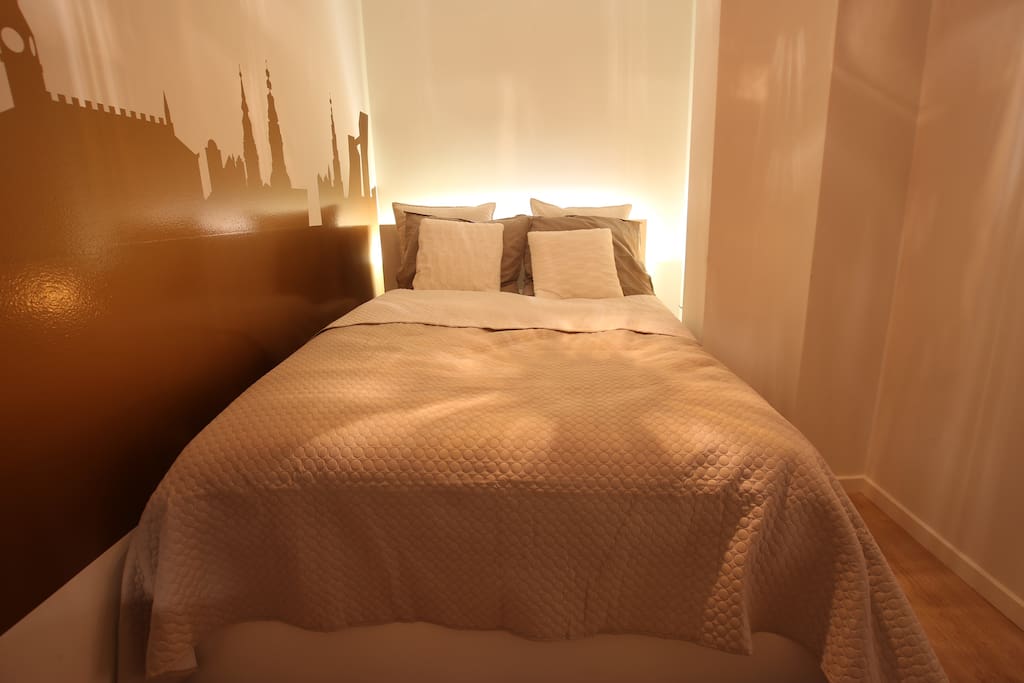 There is a variety of settings of light in the bedroom.