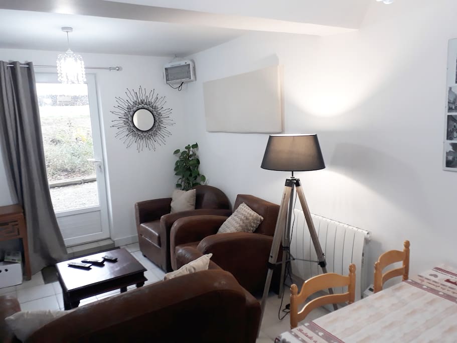 Guest lounge and dining room leading to private seating area for B&B guests