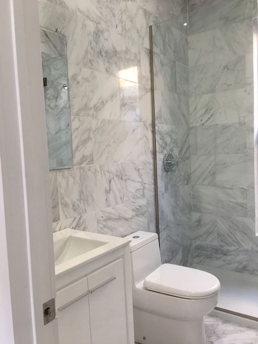 Bathroom with on demand never ending instant hot water. Super clean and brand new.