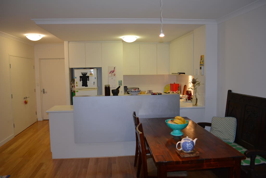 Kitchen Dining area. Antique English Pew, Clara hates it, James loves it! You decide.