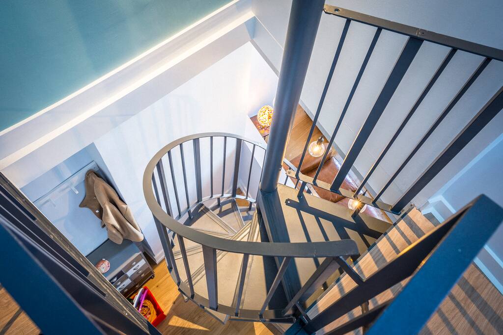 Spiral staircase to master bedroom
