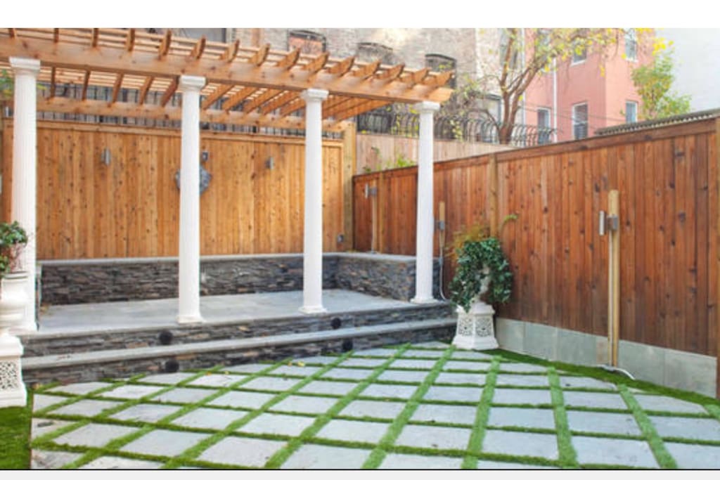 This is really the picture of your own private backyard. We have even held a wedding here. Private designer built backyard for your use only. Built in seating all around under the gazebo. Read a book, sun tan or just enjoy a private oasis in Manhattan. Incredible spot for pictures.