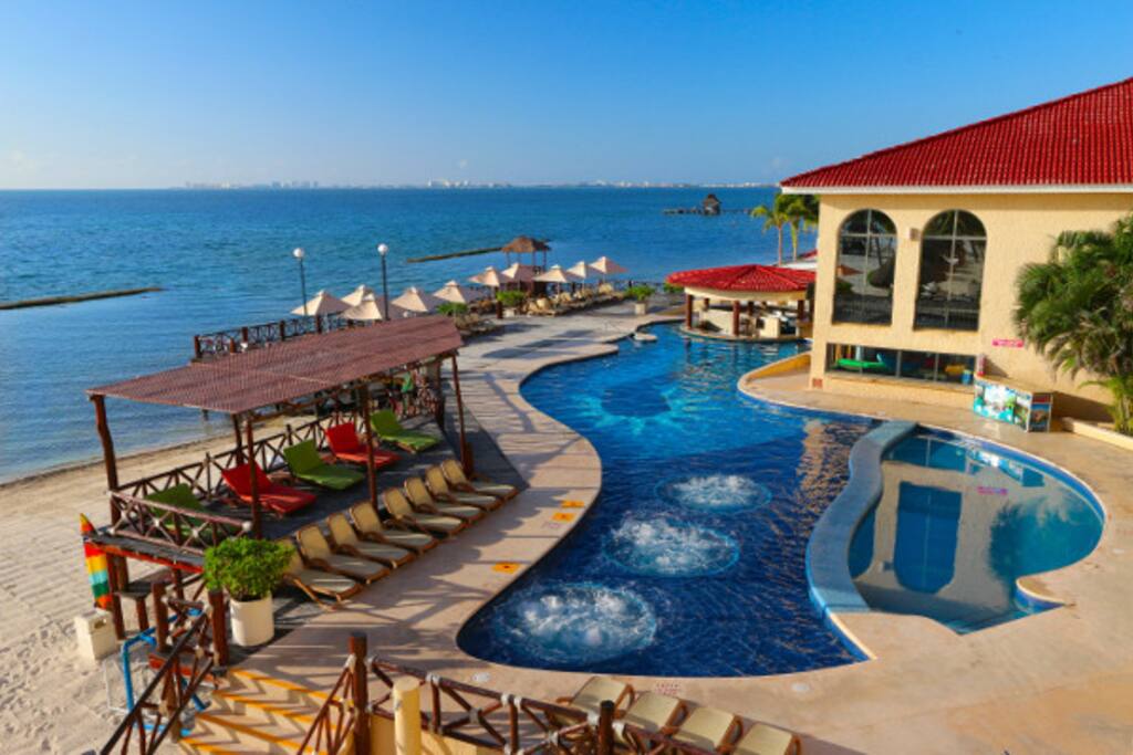 View of one of the pools with swim up bar
