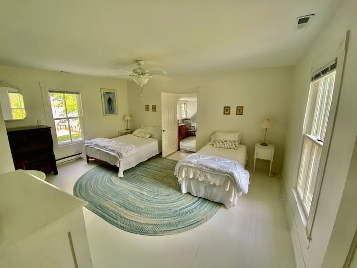 Upstairs bedroom in main house. One queen, one twin. 