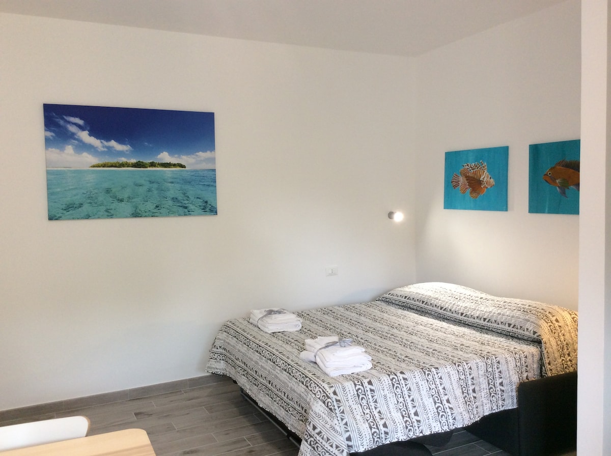 salon avec canapé-lit