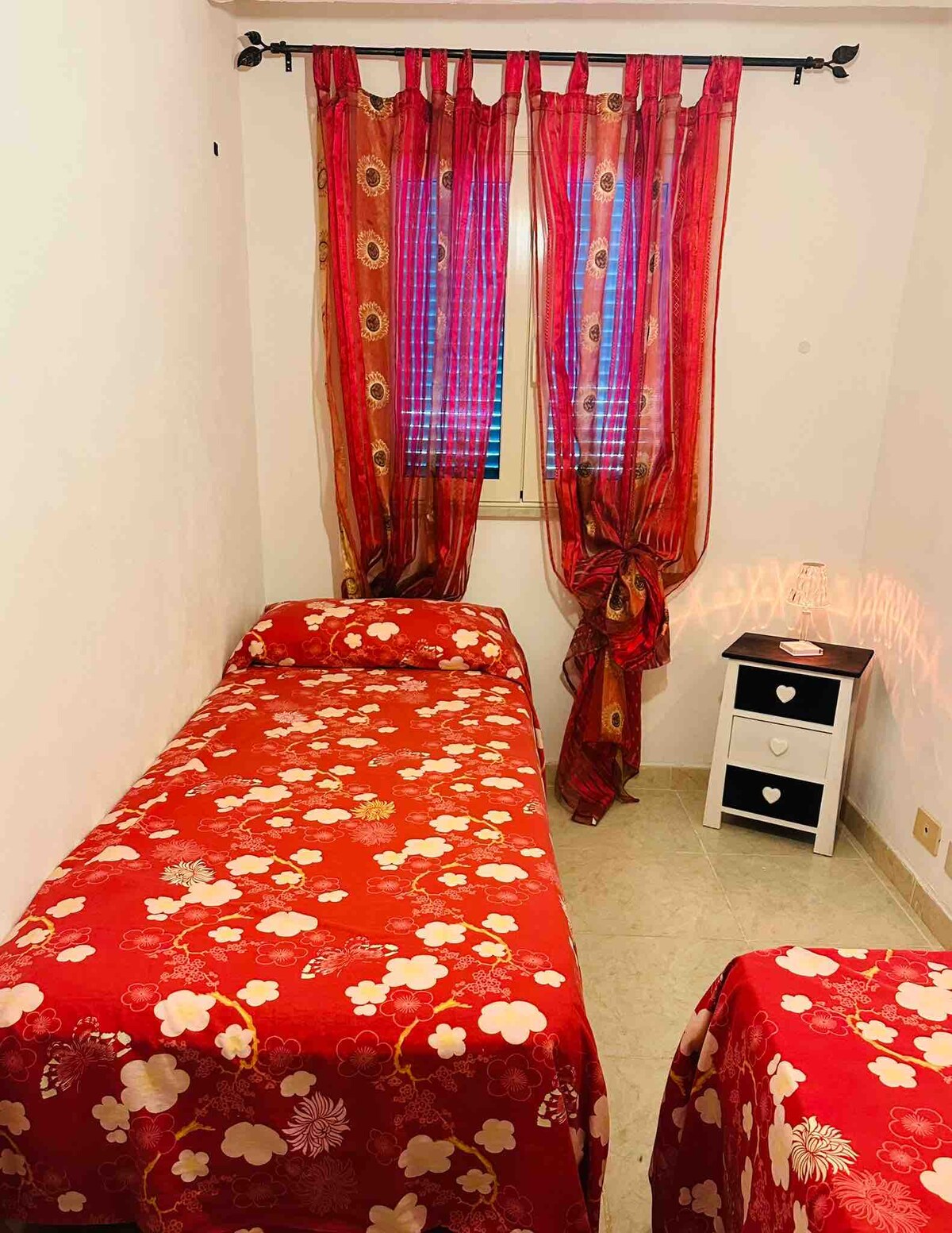 Chambre avec deux lits simples