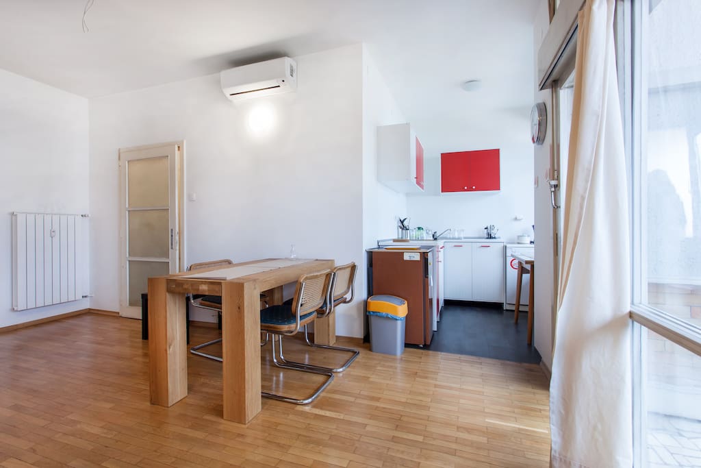 Dining area with the view towards the kitchen.