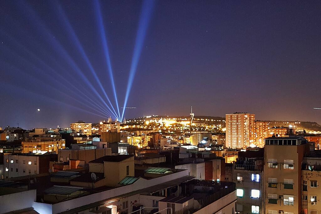 The view onto Montjuic by night - if you're lucky Palau Nacional will light its beams for you while you're here!
