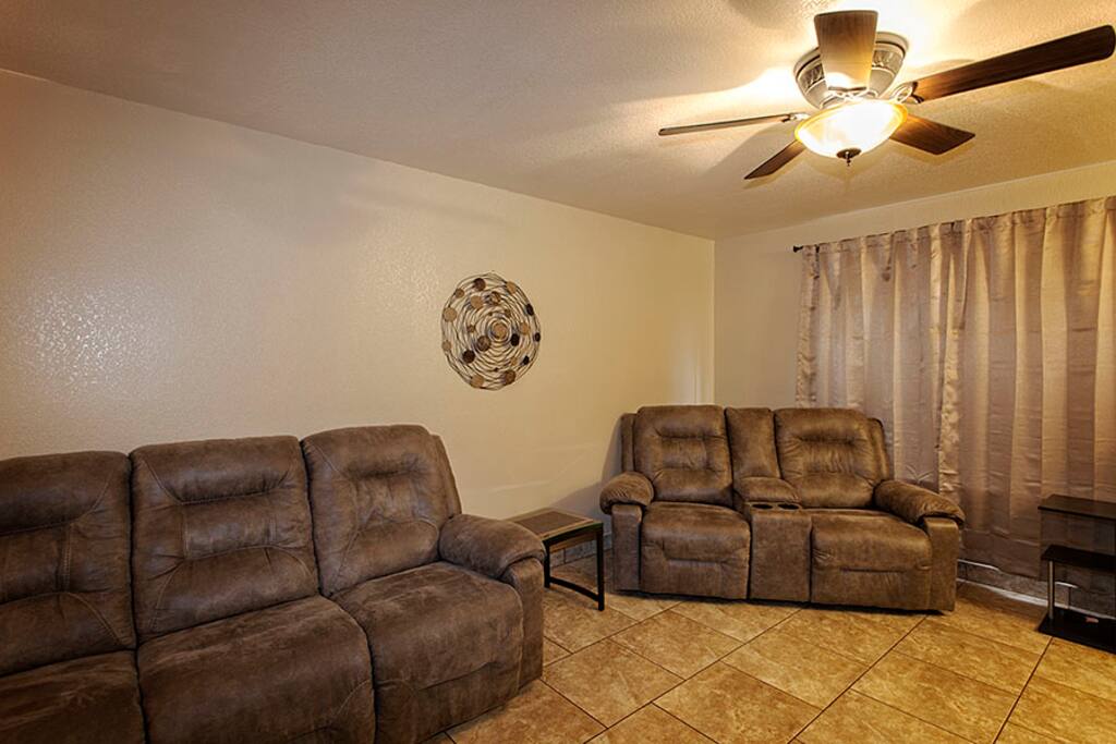 Living Area Features a Sofa and Love Seat